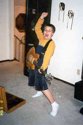Reese Playing Guitar